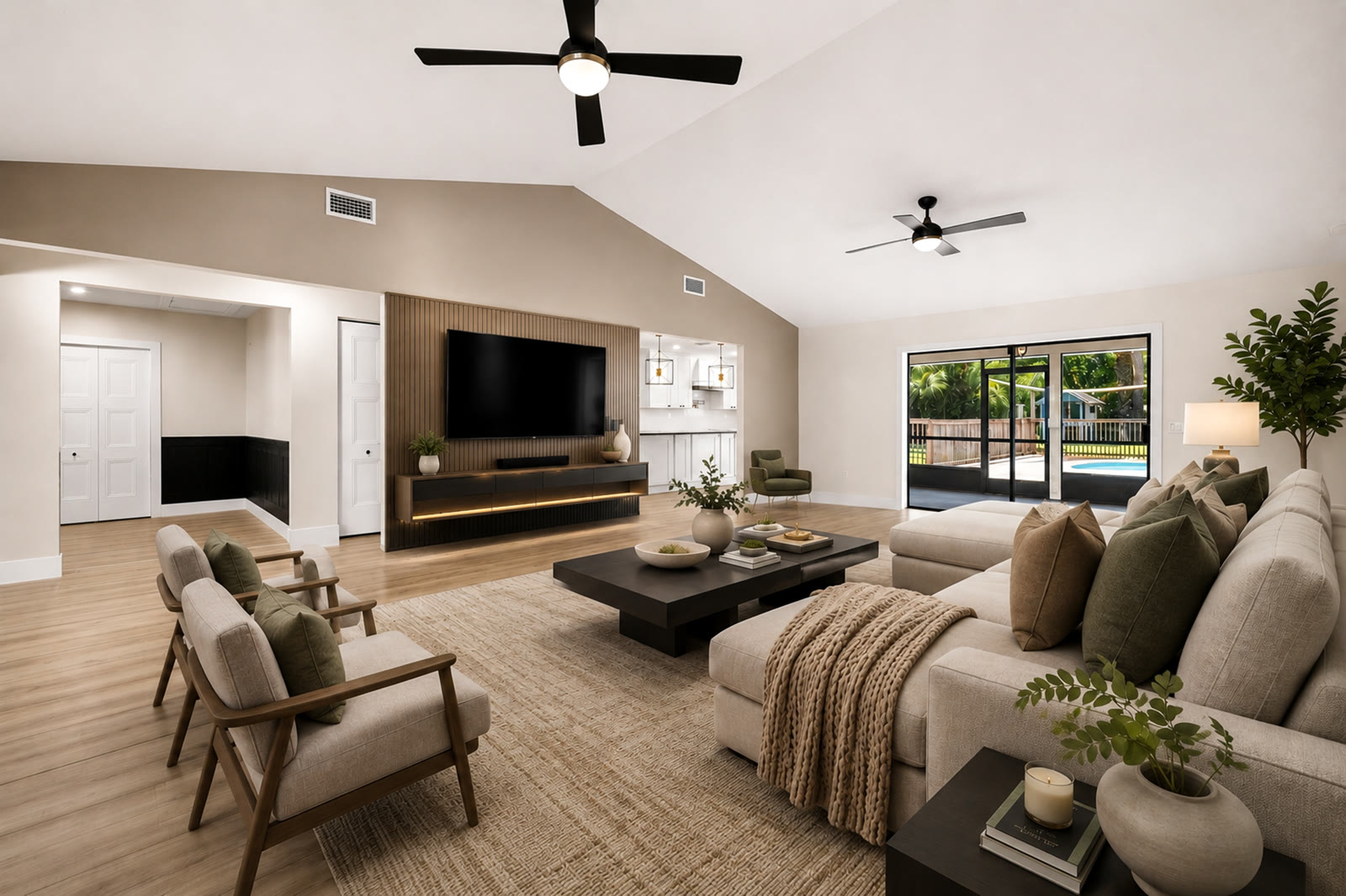 Virtually staged living room with sectional sofa and TV console in Jupiter Farms, FL