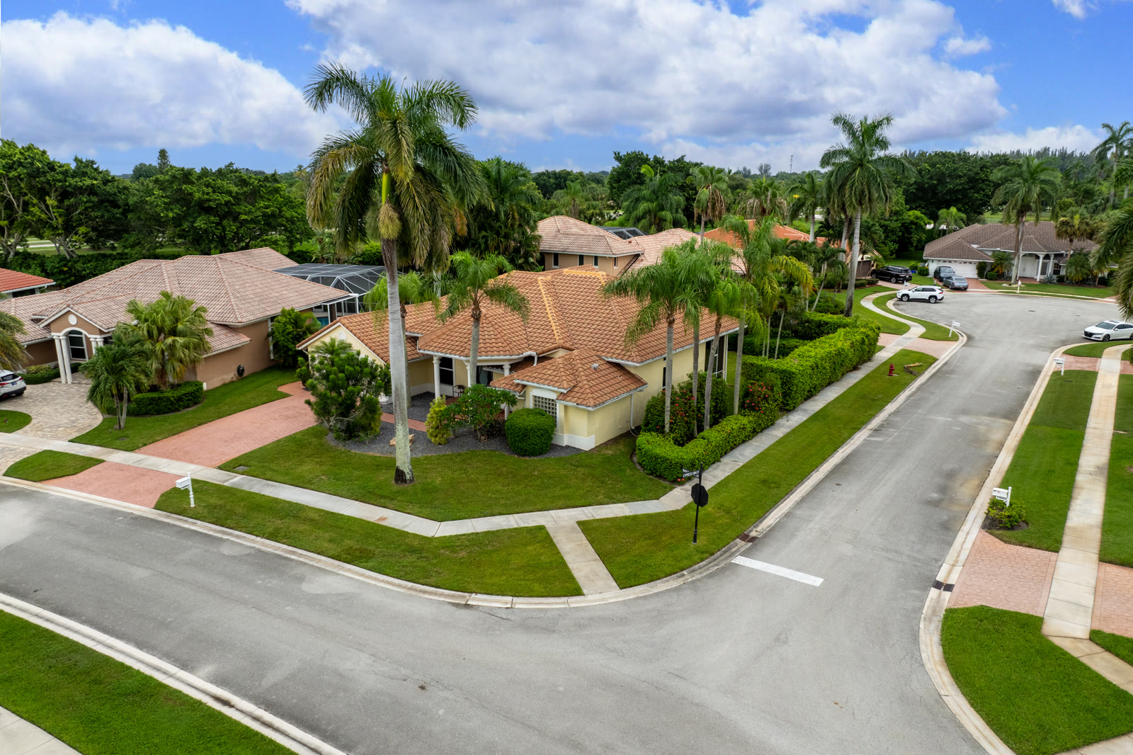 Aerial photograph of a Boca Raton home with a blue sky added in post production